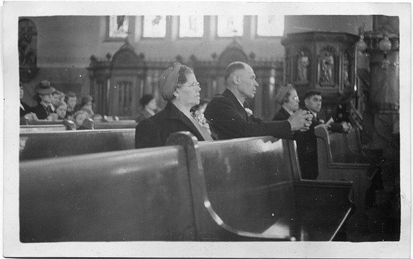 Brides parents in church
